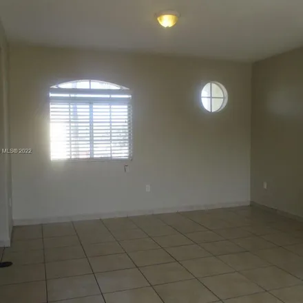Rent this 3 bed apartment on 7221 Northwest 174th Terrace in Miami-Dade County, FL 33015