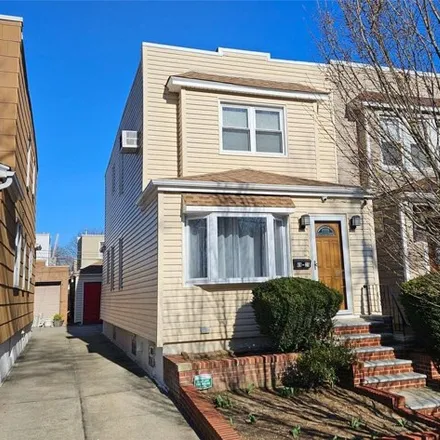 Buy this 3 bed house on 69-25 67th Place in New York, NY 11385