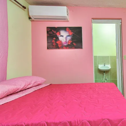 Rent this 1 bed room on Calle 7 in Los Tres Ojos, Santo Domingo Este