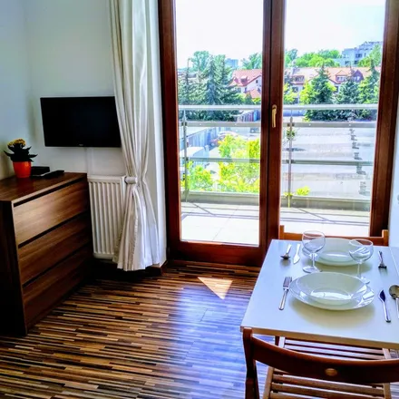 Rent this 4 bed apartment on Bobrowiecka 3A in 00-728 Warsaw, Poland