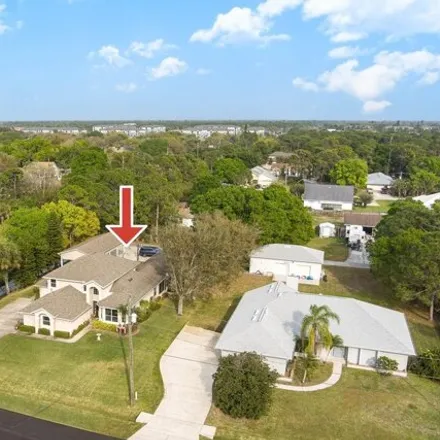 Buy this 5 bed house on 3501 Parkway Drive in Melbourne, FL 32934