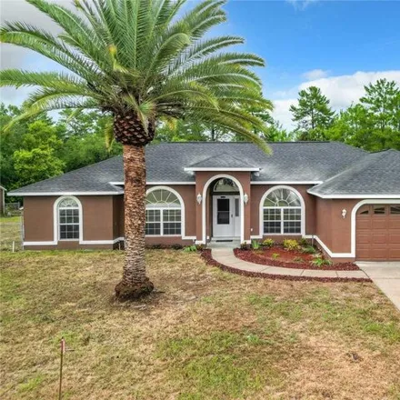 Buy this 3 bed house on 5137 SW 155th Loop in Ocala, Florida