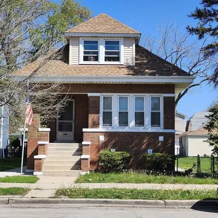 Buy this 5 bed house on 5036 West Addison Street in Chicago, IL 60641