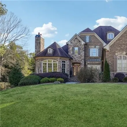 Buy this 6 bed house on 5749 Legends Club Cir in Braselton, Georgia