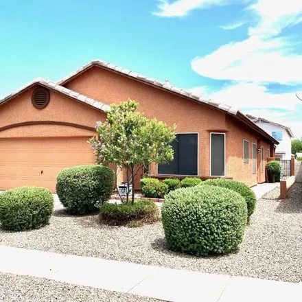 Buy this 3 bed house on 7328 W Mesquite River Dr in Tucson, Arizona