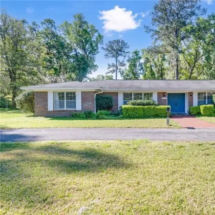 Buy this 4 bed house on 8283 Southwest 24th Avenue in Alachua County, FL 32607