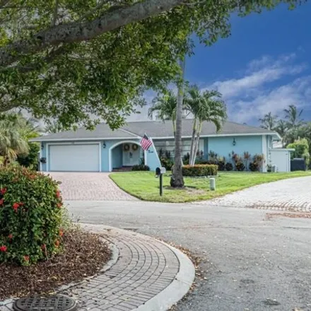Rent this 4 bed house on Shad Court in Naples, FL