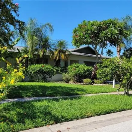 Rent this 4 bed house on 3024 Sandpiper Place in Feather Sound, Pinellas County