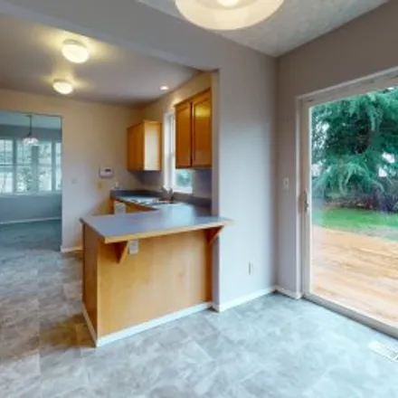 Buy this 3 bed apartment on 10660 Northeast Siskiyou Street in Parkrose Heights, Portland