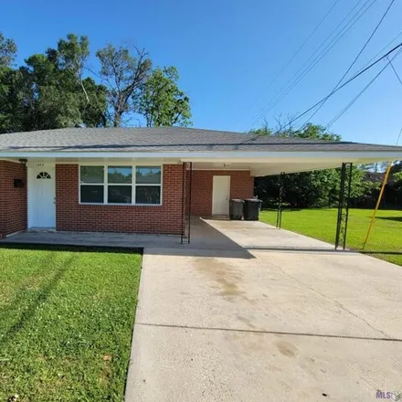 Rent this 3 bed house on 1461 Aster Street in Nicholson Estates, Baton Rouge