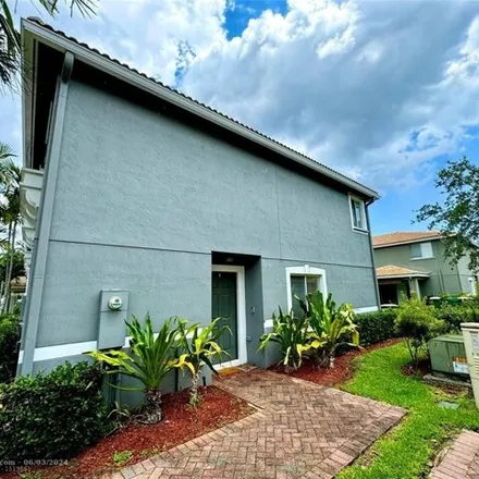 Buy this 3 bed townhouse on 5838 Glasgow Way in Tamarac, FL 33321
