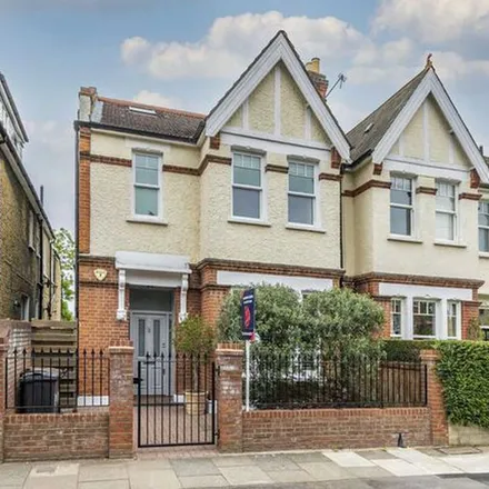 Rent this 4 bed duplex on Home Park Road in London, SW19 7HT
