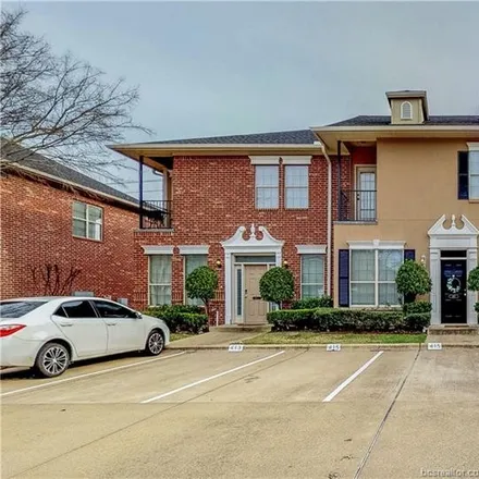 Rent this 4 bed condo on Gateway Shopping Center in unnamed road, College Station