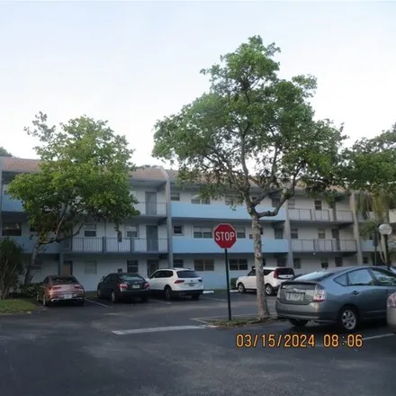 Buy this 2 bed condo on Colony West Golf Club - Championship Course in 6800 North Pine Island Road, Tamarac