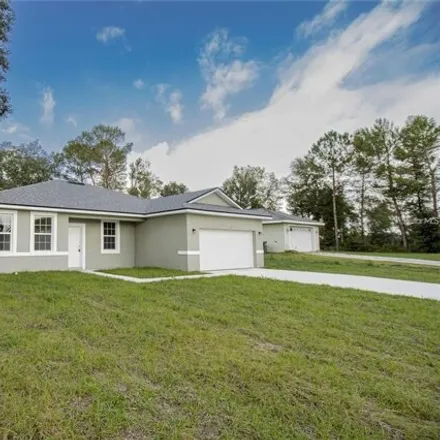 Buy this 4 bed house on 13601 SW 40th Cir in Ocala, Florida