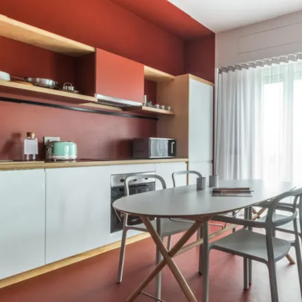 Rent this 2 bed apartment on Charming 2-bedroom apartment near Via Valvassori Peroni tram station  Milan 20133