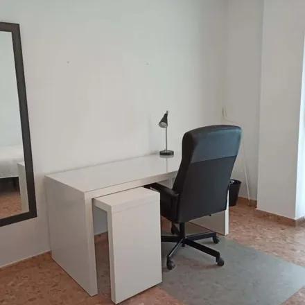 Rent this 3 bed room on Carrer del Riu Jalón in 46011 Valencia, Spain