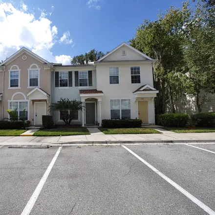 Rent this 2 bed townhouse on 3542 Twisted Tree Lane in Jacksonville, FL 32216