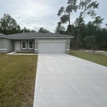 Buy this 4 bed house on 13801 Southwest 43rd Circle in Marion County, FL 34473