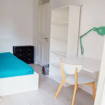 Rent this 3 bed room on Rua Carvalho Araújo 90 in 1900-140 Lisbon, Portugal