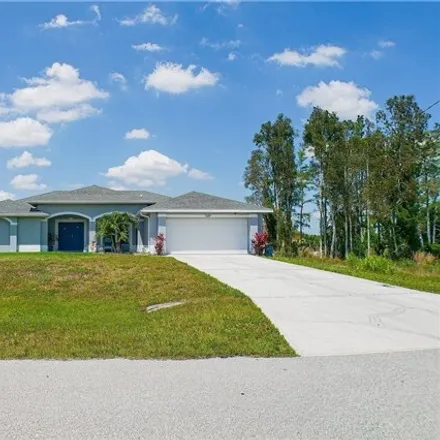 Rent this 3 bed house on 1115 Chapel Avenue in Lehigh Acres, FL 33971