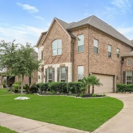 Buy this 4 bed house on 9761 Reston River Lane in Cypress Creek Lakes, TX 77433