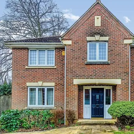 Buy this 4 bed house on Coombe Wood in Vicarage Close, Colgate