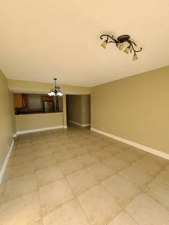 Buy this 3 bed condo on 1648 Windorah Way in Golden Lakes, Palm Beach County