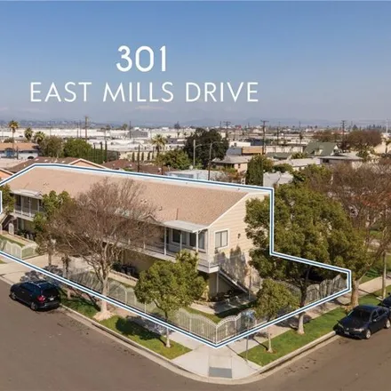 Buy this 8 bed house on 301 East Mills Drive in Anaheim, CA 92805