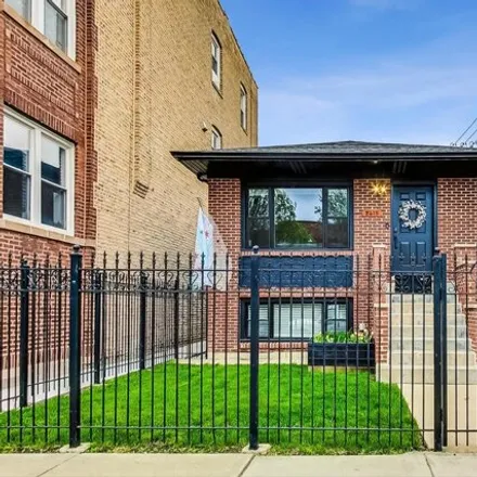 Buy this 4 bed house on 2415 North Ridgeway Avenue in Chicago, IL 60647