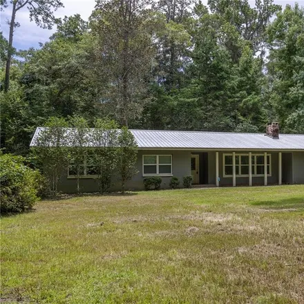 Buy this 4 bed house on 6895 Northwest 63rd Avenue in Alachua County, FL 32653