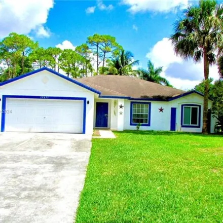 Rent this 3 bed house on 13683 Temple Boulevard in Palm Beach County, FL 33412