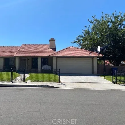 Rent this 3 bed house on 2702 College Park Drive in Lancaster, CA 93536