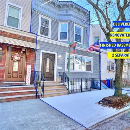 Buy this 5 bed house on 79-54 78th Avenue in New York, NY 11385
