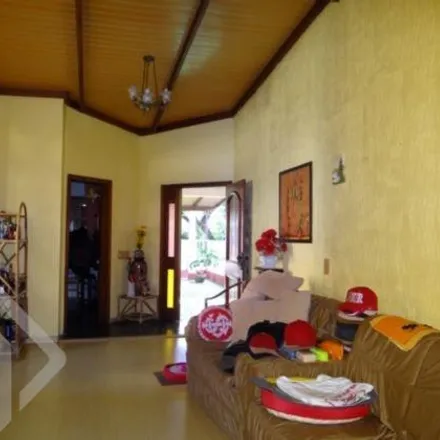 Buy this 3 bed house on Rua Antônio Farias in Partenon, Porto Alegre - RS