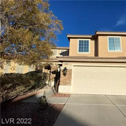 Rent this 4 bed house on 5942 Moon Garden Street in Spring Valley, NV 89148
