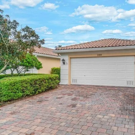 Buy this 2 bed house on 2068 Guadeloupe Drive in Wellington, FL 33414