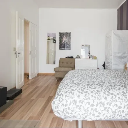 Rent this 6 bed room on Rua de Cabo Verde 4 in 1170-245 Lisbon, Portugal