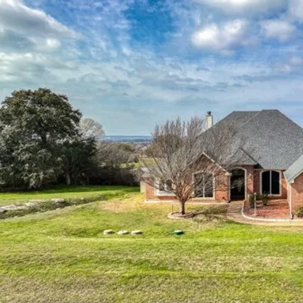 Buy this 4 bed house on 1705 Bentwater Parkway in Brazos Bend, Hood County