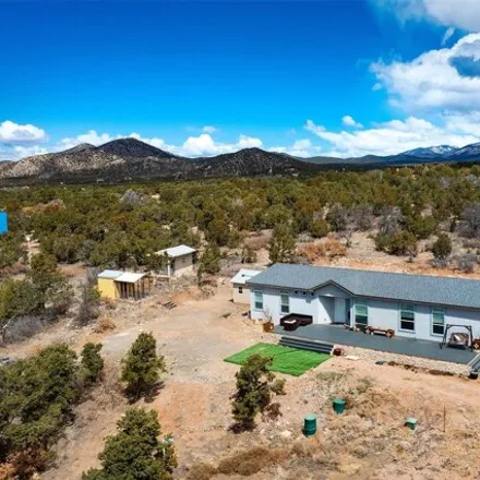 Buy this 3 bed house on 2 Apache Creek Ranch in Santa Fe County, NM 87505