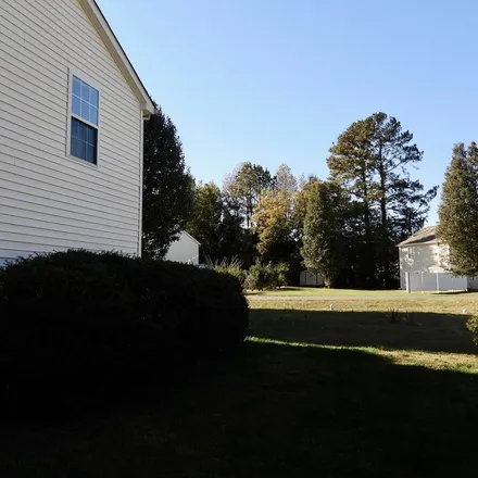 Rent this 4 bed apartment on 38 Silverstone Drive in Pittsboro, NC 27312