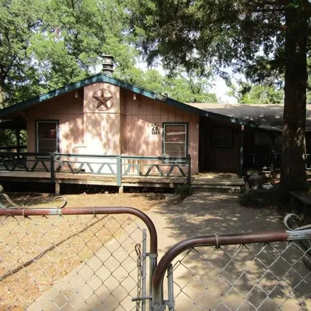 Rent this 3 bed house on 1117 Woodland Trl in Tool, Texas