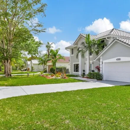 Buy this 4 bed house on 9110 Northwest 43rd Court in Coral Springs, FL 33065