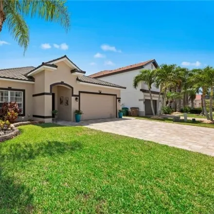 Buy this 4 bed house on 2055 Willow Branch Drive in Cape Coral, FL 33991