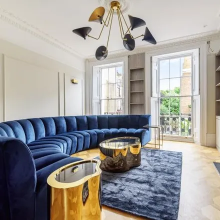Rent this 4 bed townhouse on 12 Albion Street in London, W2 2LG