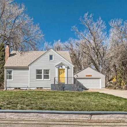 Buy this 4 bed house on 6971 West 26th Avenue in Wheat Ridge, CO 80033