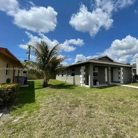 Buy this 3 bed house on 165 Northwest 17th Court in Kendall Green, Pompano Beach