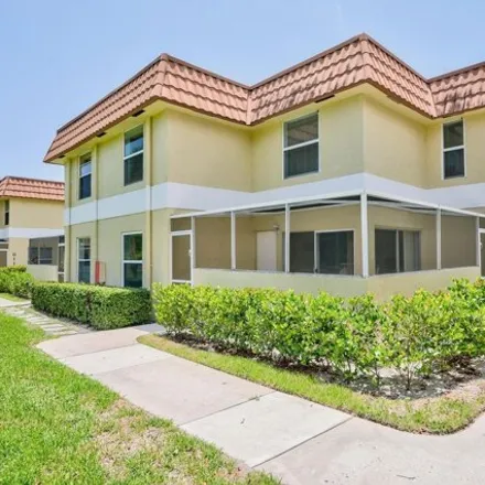 Rent this 2 bed townhouse on Villas on the Green in Jupiter, FL