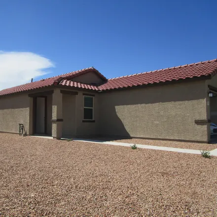 Rent this 4 bed house on 1022 East 25th Street in Tucson, AZ 85713