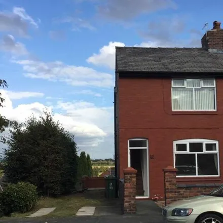 Rent this 2 bed townhouse on Upholland Road in Far Moor, WN5 7JH